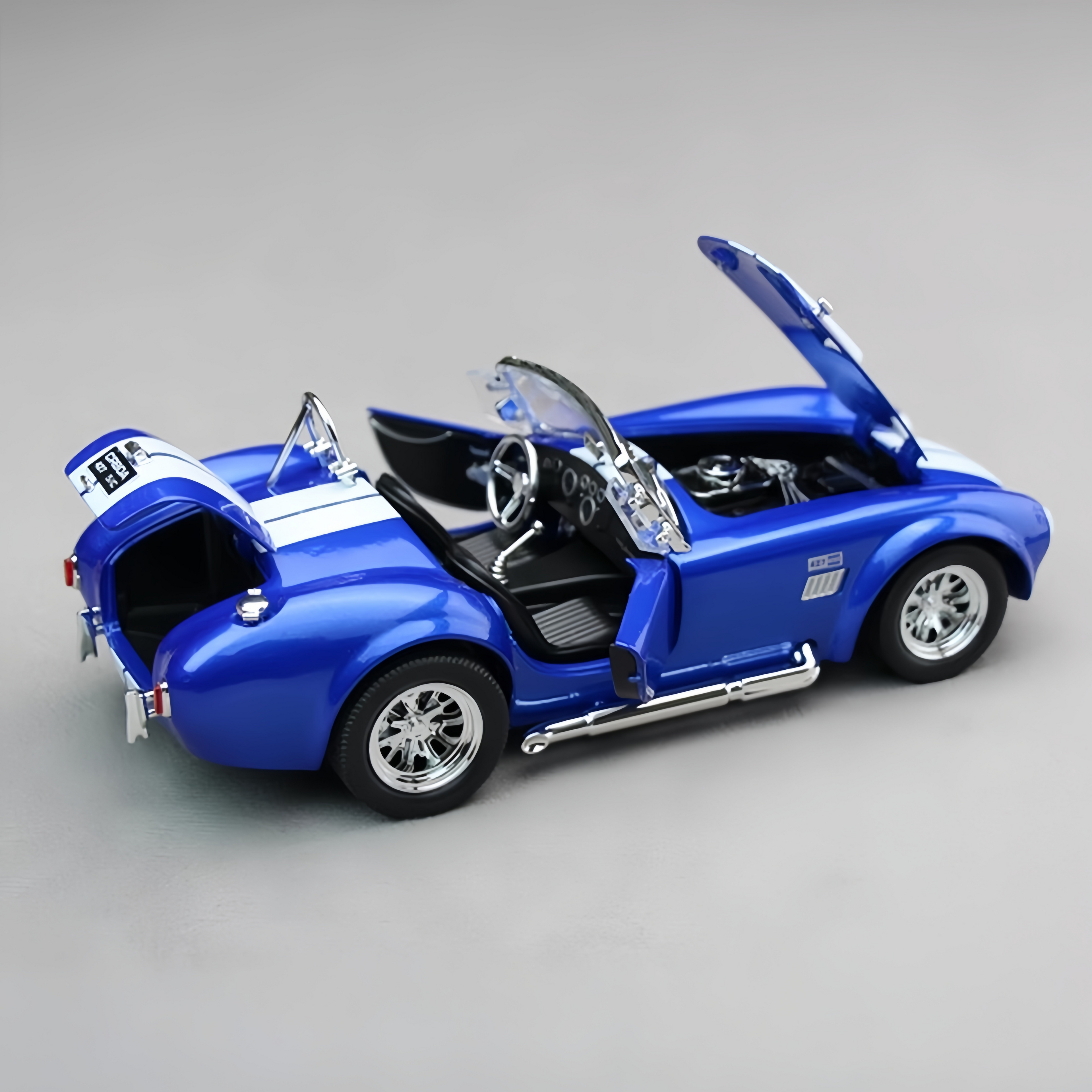 Shelby Cobra 427 1:24 Scale Diecast Model - Alloy Body, Detailed Interior, Opening Parts & Classic Knock-Off Wheels